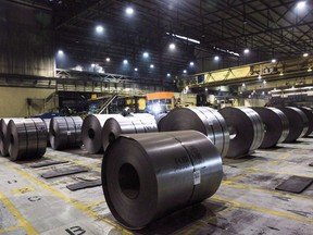 Rolls of coiled steel are seen at Canadian steel producer Dofasco in Hamilton Ont., Tuesday, March 13, 2018. The House of Commons trade committee will be back at work later today with a special meeting that has one major aim, demonstrating the broad economic pain of the Trump administration's crushing steel and aluminum tariffs.