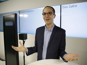Dan Zafrir prepares for his debate against the IBM Project Debater Monday, June 18, 2018, in San Francisco. IBM on Monday will pit a computer against two human debaters in the first public demonstration of artificial intelligence technology it's been working on for more than five years. The system, called Project Debater, is designed to be able to listen to an argument, then respond in a natural-sounding way, after pulling in evidence it collects from Wikipedia, journals, newspapers and other sources to make its point.