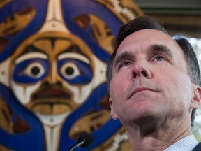 Bill Morneau, Canada's minister of finance, listens during a news conference at the closing of the G7 finance ministers and central bank governors meeting in Whistler, British Columbia, Canada, on Saturday, June 2, 2018.