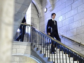 Prime Minister Justin Trudeau walks to Question Period in the House of Commons on Parliament Hill in Ottawa on Monday, June 4, 2018. Climate experts say Canada's decision to buy the Trans Mountain pipeline puts added pressure on Prime Minister Justin Trudeau to deliver a solid plan on climate change and the Paris agreement at the G7 later this week.THE CANADIAN PRESS/Justin Tang