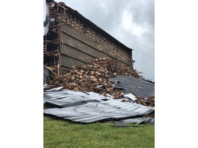 In this image provided by the Bardstown, Ky., Fire Department, debris is piled in a heap after a section of a bourbon storage warehouse at the Barton 1792 Distillery collapsed, Friday June 22, 2018, in Bardstown, Ky. Nelson County Emergency Management spokesman Milt Spalding says about 9,000 barrels filled with aging bourbon were affected.