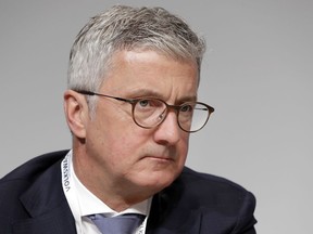 FILE - In this Thursday, May 3, 2018 file photo, Rupert Stadler, CEO of Audi AG, attends the shareholders' meeting of the Volkswagen stock company in Berlin, Germany. German prosecutors say they have expanded their probe into manipulation of emissions controls at Volkswagen's Audi division to include Audi's CEO, Rupert Stadler. Munich prosecutors said Stadler's private residence was searched on Monday, June 11 along with that of another division manager whose name was not released.