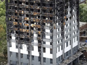 FILE - In this Friday, June 23, 2017 file photo, the burnt Grenfell Tower after the recent fire in London. An inquiry into the fire that tore through London's Grenfell Tower high-rise almost a year ago, killing 72 people, began evidence hearings Monday June 4, 2018, with a lawyer vowing it would address the "overwhelming question: Why?" The judge-led inquiry, which is expected to last about 18 months, aims to find the causes of Britain's deadliest fire in decades and to prevent future tragedies.