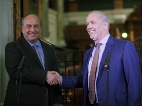 B.C. Green party leader Andrew Weaver (left) and B.C. NDP leader John Horgan
