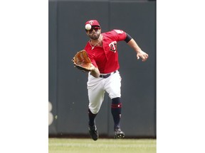 Minnesota Twins center fielder Ryan LaMarre catches a shallow fly ball off the bat of Boston Red Sox' s Xander Bogaerts in the fourth inning of a baseball game Thursday, June 21, 2018, in Minneapolis.