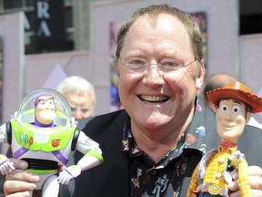 FILE - In this June 13, 2010 file photo, John Lasseter arrives at the world premiere of "Toy Story 3," at The El Capitan Theater in Los Angeles. John Lasseter, the co-founder of Pixar Animation Studios and the Walt Disney Co.'s animation chief, will step down at the end of the year after acknowledging "missteps" in his behavior with staff members.Disney announced Friday, June 8, 2018 that Lasseter will stay on through the end of 2018 as a consultant. After that he will depart permanently.