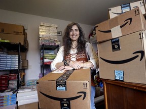 FILE - In this April 6, 2018, photo, Adrienne Kosewicz, owner of Play It Safe World Toys, poses for a portrait in her home office in Seattle. Kosewicz pays $3,600 a year for tax collection software to handle payments and reports to her home state, Washington. Her Seattle-based online business sells through Amazon, which handles computation and collection. States will be able to force shoppers to pay sales tax when they make online purchases under a Supreme Court decision Thursday, June 21, that will leave shoppers with lighter wallets but is a big win for states.