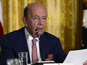 FILE - In this Monday, June 18, 2018, file photo, Commerce Secretary Wilbur Ross speaks at a National Space Council meeting in the East Room of the White House in Washington. Ross made a trade betting that the stock in a shipping company with Russian-government ties would fall, a transaction coming just days after he learned of a possible negative news story about his investment in the company. Ross reported on a government form released Monday, as required by federal ethics rules, that he shorted stock in Navigator Holdings in October.