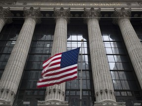FILE- In this April 24, 2018, file photo, an American flag flies outside the New York Stock Exchange in New York. The U.S. stock market opens at 9:30 a.m. EDT on Tuesday, June 5.