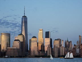 In this June 7, 2018 photo, One World Trade Center towers over its neighbors, including 3 World Trade Center, center, an 80-story office building in New York.
