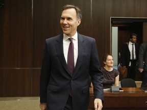 Finance Minister Bill Morneau arrives at the Commons committee on the statutory review of the Proceeds of Crime and Terrorist Financing Act in Ottawa on Wednesday, June 20, 2018.