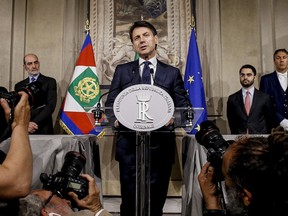 Giuseppe Conte addresses the media at the Quirinale presidential palace in Rome, Thursday, May 31, 2018. Italy's president has tapped law professor Giuseppe Conte to be Italy's next premier heading Italy's first populist government. The president's office announced Thursday that Conte had accepted the role, and that he would be sworn in Friday afternoon with ministers.