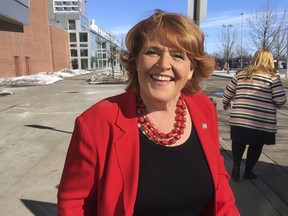 FILE - This March 17, 2018, file photo, shows Democratic U.S. Sen. Heidi Heitkamp in Grand Forks, N.D. President Donald Trump's stepped-up campaign tour the week of June 25, 2018, is taking him to North Dakota to help U.S. Rep. Kevin Cramer, a Republican candidate who reluctantly entered the high-stakes Senate race and then questioned the support he has received from the White House. Cramer made it clear he was less than happy with Trump's friendly treatment of his opponent, Heitkamp.