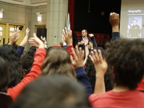 Rich Wistocki, a recently retired cybercrime detective who started his own consulting company, speaks to students at Nathan Hale Elementary School in Chicago on Friday, June 8, 2018. When asked how many are on social media, most students raised their hands, including those younger than 13, the supposed age limit for social media.