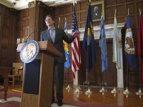 Gov. Steve Bullock gives remarks before signing an executive order requiring major state government contractors to disclose any contributions to so-called "dark money" groups that aren't required to disclose their donors under federal election laws in Helena, Mont., on Friday, June 8, 2018.