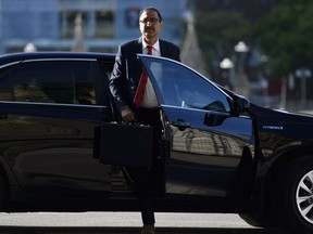 Infrastructure and Communities Minister Amarjeet Sohi arrives for an early morning cabinet meeting on Parliament Hill in Ottawa on Tuesday, May 29, 2018.