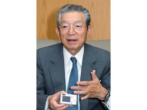 In this Aug. 2003, photo, then Casio Computer Co. President Kazuo Kashio speaks in an interview in Tokyo. Kashio, one of four brothers who founded Casio Computer Co., the Japanese company behind G-Shock watches, has died, the company said Tuesday, June 19, 2018. He was 89.  Kashio, who was chairman and served previously as president, died Monday, June 18,  of aspiration pneumonia, which is set off by breathing in food or liquids. (Kyodo News via AP)