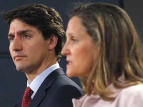 Prime Minister Justin Trudeau and Foreign Affairs Minister Chrystia Freeland speak at a press conference in Ottawa on Thursday.