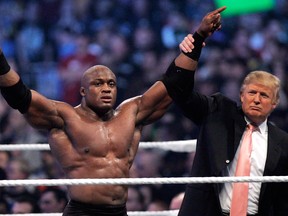 Donald Trump raises the arm of wrestler Bobby Lashley after he defeated Umaga at Wrestlemania 23 in Detroit in 2007. Wrestling aficionados say the president has, consciously or not, long borrowed the time-tested tactics of the game to cultivate the ultimate antihero character, a figure who wins at all costs, incites outrage and follows nobody’s rules but his own.