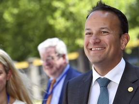 Irish Prime Minister Leo Varadkar, right, arrives for an EPP party meeting ahead of an EU summit in Brussels, Thursday, June 28, 2018. European Union leaders meet for a two-day summit to address the political crisis over migration and discuss how to proceed on the Brexit negotiations.