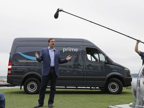 Dave Clark, senior vice president of worldwide operations for Amazon.com, talks to reporters, Wednesday, June 27, 2018, in Seattle, at a media event to announce a new program that lets entrepreneurs around the country launch businesses that deliver Amazon packages. It's another way for Amazon to gain greater control over how its packages are delivered.