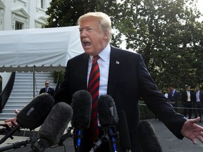 President Donald Trump speaks to reporters before leaving the White House in Washington, Friday, June 8, 2018, to attend the G7 Summit in Charlevoix, Quebec, Canada.