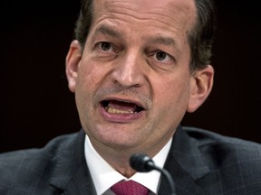 FILE - In March 14, 2018 file photo, Labor Secretary Alex Acosta speaks during a Senate Committee on Commerce, Science, & Transportation hearing on Capitol Hill in Washington.  The Trump administration is preparing to announce a new insurance option for small firms and self-employed people that would cost less but could cover fewer benefits than current plans.