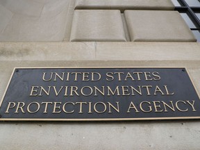 This Sept. 21, 2017 file photo shows the Environmental Protection Agency (EPA) Building in Washington.  The Government Accountability Office has agreed to examine the legality of a politically-tinged tweet from the official Environmental Protection Agency account.