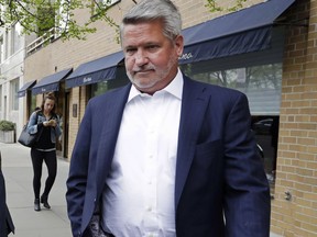 FILE - In this April 24, 2017, file photo, then-Fox News co-president Bill Shine, right, leaves a New York restaurant. President Donald Trump is expected to name Shine as director of White House press and communications. That's according to a person familiar with Trump's thinking, who spoke on condition of anonymity to discuss the president's plans.