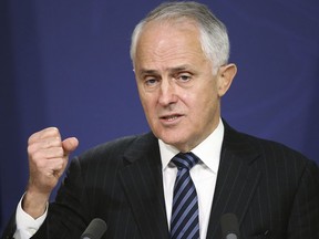 FILE - In this Aug. 10, 2016 file photo, Australia's Prime Minister Malcolm Turnbull speaks in Sydney. Turnbull said on Thursday, June 7, 2018, he would welcome Facebook founder and chief executive Mark Zuckerberg testifying to an Australian parliamentary committee on the social media giant's sharing of data with Chinese phone maker Huawei.