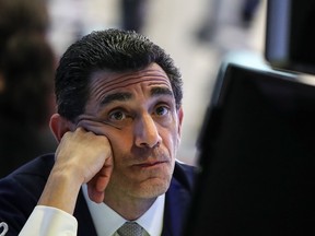 A trader works at his desk at the New York Stock Exchange at the end of June, 2018. Markets have mainly gone sideways this year.