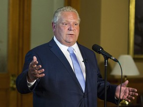Ontario Premier Doug Ford speaks to media outside of his office at Queen's Park in Toronto, Ont. on Wednesday July 11, 2018.