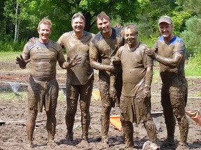 The author, Joe Recupero, second from right, as he competed in the Tough Mudder race in 2014.
