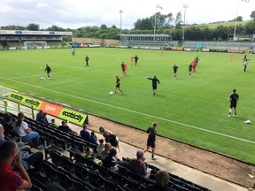 In this Monday, July 30, 2018 photo, players training at The New Lawn, Forest Green Rovers' football ground, in Nailsworth, England. An English soccer club has become the first professional sports team in the world to be certified as carbon neutral by the United Nations.