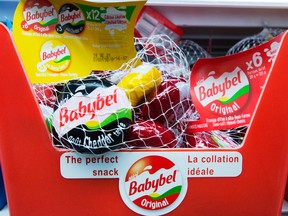 Bags of Mini Babybel cheese snacks are seen at a grocery store in St. Marthe, Que., on Friday, July 13, 2018. The Bel Group says it will spend $87 million to build a factory to produce Mini Babybel cheese snacks in Quebec.