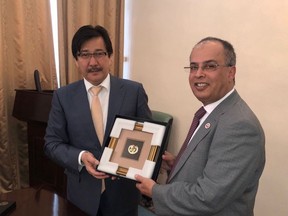 The Al-Farabi Kazakh National University (KazNU) Rector, Professor Galimkair Mutanov, of the Republic of Kazakhstan and the American University of Ras Al Khaimah (AURAK) President, Professor Hassan Hamdan Al Alkim, exchange a gift to commemorate their universities uniting in an MoU agreement.