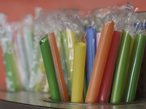 This July 17, 2018 photo shows wrapped plastic straws at a bubble tea cafe in San Francisco. Eco-conscious San Francisco joins the city of Seattle in banning plastic straws, along with tiny coffee stirrers and cup pluggers, as part of an effort to reduce plastic waste. It also makes single-use food and drink side items available upon request and phases out the use of fluorinated wrappers and to-go containers.