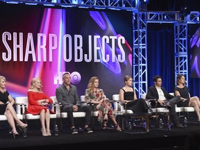 Executive producer/showrunner Marti Noxon, from left, Patricia Clarkson, executive producer/director Jean-Marc Vallee, executive producer/actress Amy Adams, Eliza Scanlen, Chris Messina and executive producer/writer Gillian Flynn participate in the "Sharp Objects" panel during the HBO Television Critics Association Summer Press Tour at The Beverly Hilton hotel on Wednesday, July 25, 2018, in Beverly Hills, Calif.