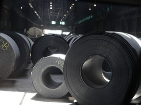 In this June 28, 2018 photo, Rolls of finished steel are seen at the U.S. Steel Granite City Works facility in Granite City, Ill. President Donald Trump will visit the facility on Thursday, July 26, 2018. U.S. Steel credited Trump's plan to impose tariffs on imported steel and aluminum when the company announced in March it was firing up a furnace at Granite City Works that had been idled for more than two years.