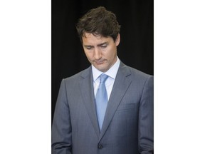 Prime Minister Justin Trudeau attends a meeting with Frank Scarpitti, Mayor of Markham during an event in Markham, Ont. on Friday, July 20, 2018.