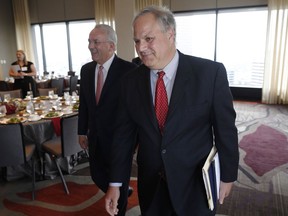 U.S. Deputy Secretary of the Interior David Bernhardt, foreground, and Jack Gerard, American Petroleum Institute president and chief executive officer, head up to speak during the annual state of Colorado energy luncheon sponsored by the Colorado Petroleum council Thursday, July 26, 2018, in Denver.
