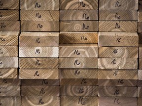 Cedar planks are stacked at a lumber yard, Tuesday, April 25, 2017 in Montreal. Statistics Canada says wholesale sales rose 1.2 per cent to $63.7 billion in May.The gains were helped by higher sales of lumber, millwork, hardware and other building supplies.THE CANADIAN PRESS/Paul Chiasson