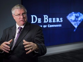 Kim Truter, CEO of De Beers Canada, speaks to reporters at the opening of their facility in Calgary, Alta., Wednesday, July 6, 2016. De Beers Canada Inc. has signed a deal to acquire Peregrine Diamonds Ltd. in a offer valued at $107 million.