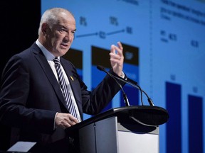 Suncor president and CEO Steve Williams addresses the company's annual meeting in Calgary, Wednesday, May 2, 2018. Williams says its partners in the Syncrude oilsands mining operation are resisting taking actions that could solve ongoing performance issues at the five-decade-old northern Alberta operation.