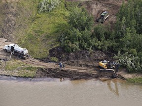The James Smith Cree Nation and the Cumberland House Cree Nation are filing legal paperwork, seeking reparations from Husky Energy following the 2016 oil spill into the North Saskatchewan River. Crews work to clean up an oil spill on the North Saskatchewan river near Maidstone, Sask on Friday July 22, 2016.