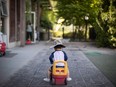 A young boy plays at a daycare, in Langley, B.C., on Tuesday May 29, 2018. Government ministers and Liberal MPs held dozens of events Thursday to highlight two years since the Liberals introduced the Canada Child Benefit. Starting Friday, the value of the means-tested benefit goes up to keep pace with inflation.