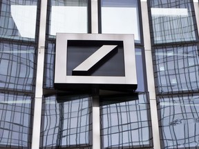 FILE - In this Monday, April 9, 2018, file photo the bank's logo is seen at a building of Deutsche Bank in Frankfurt, Germany. Deutsche Bank presents the figures of the second quarter 2018 on Thursday, April 26, 2018.