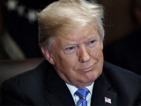 U.S. President Donald Trump speaks during a cabinet meeting in the Cabinet Room of the White House, July 18, 2018. Trump told reporters he is building a good rapport with Mexico’s president-elect.