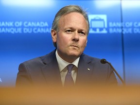 Governor of the Bank of Canada Stephen Poloz listens to questions during an interest rate announcement at the Bank of Canada in Ottawa on Wednesday, July 11, 2018.