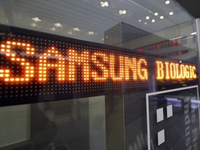FILE - In this Nov. 10, 2016, file photo, a name of Samsung Biologics Co. is displayed at the Korea Exchange in Seoul, South Korea. A South Korean regulator says Samsung Biologics has intentionally breached accounting rules. The Financial Services Commission said Thursday, July 13, 2018, that it will bring the case to prosecutors and ask Samsung Biologics to dismiss executives in charge of accounting breaches.